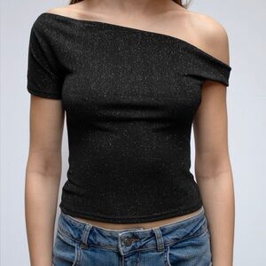 Subdued asymmetric neckline shirt in light blue sparkle